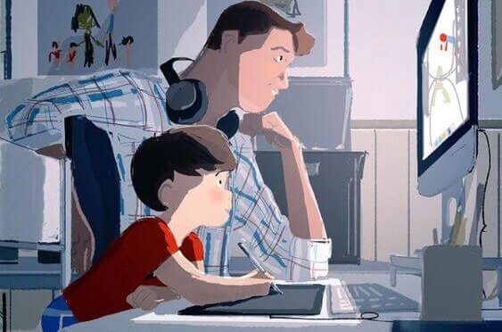 Vater mit Sohn am Computer